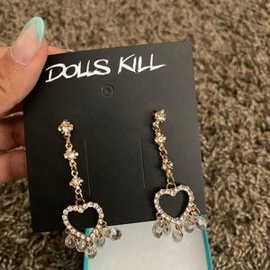 super cute dangly dolls kill heart earrings.